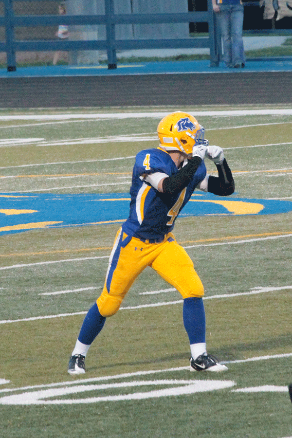 Senior wide receiver Trae Kaufmann stands at a ready position during the first half against Kelly Walsh. 