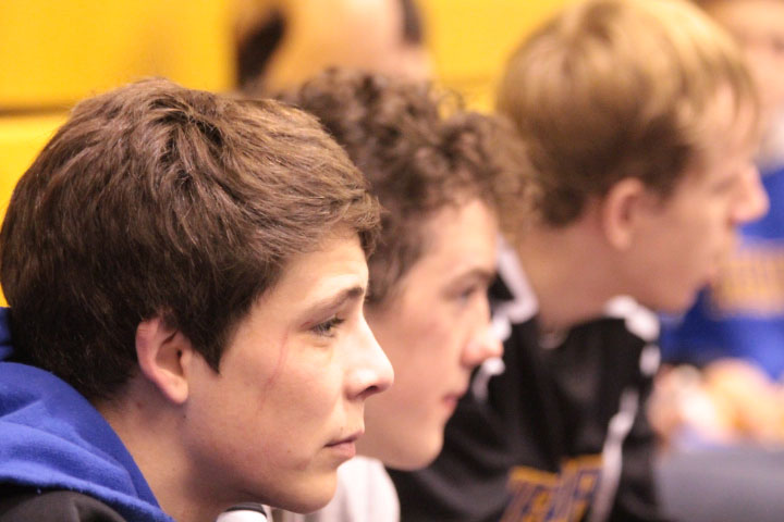 Gage Tyree and Cody Delk look on as they wait for their matches.