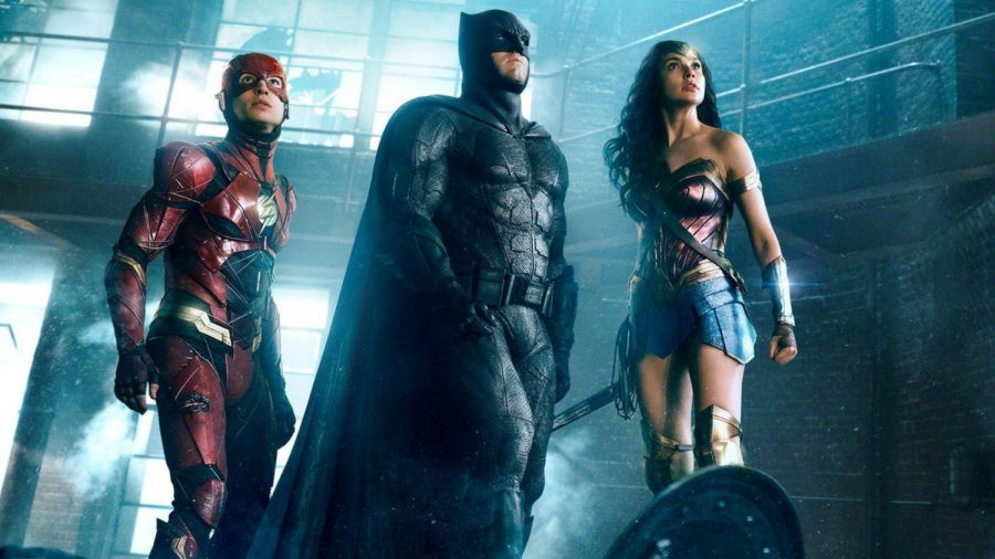 The Flash (Ezra Miller), Batman (Ben Affleck), and Wonderwoman (Gal Gadot) stand ready to battle Steppenwolf. (Photo courtesy DC Films)