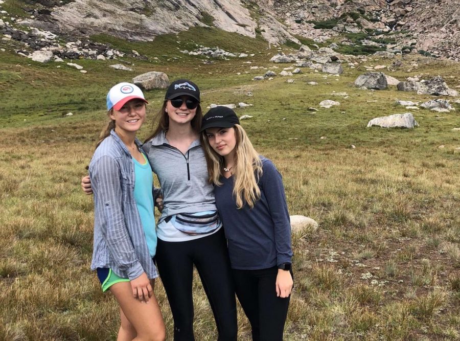 Aria Heyneman, Maggie Kuehl, and her cousin Julia Twiford hike through Cloud Peak wilderness.