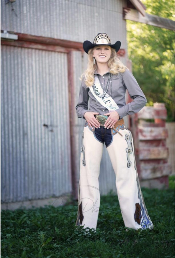 Konetzki smiles, donning her Rodeo Queen sash. 