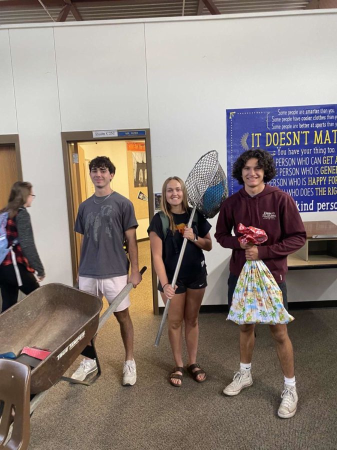 Seniors, Patrick Aasby, Riley Bunting and Aiden Roth brought items to replace their backpacks for the homecoming dress up day, Anything but a Backpack. 