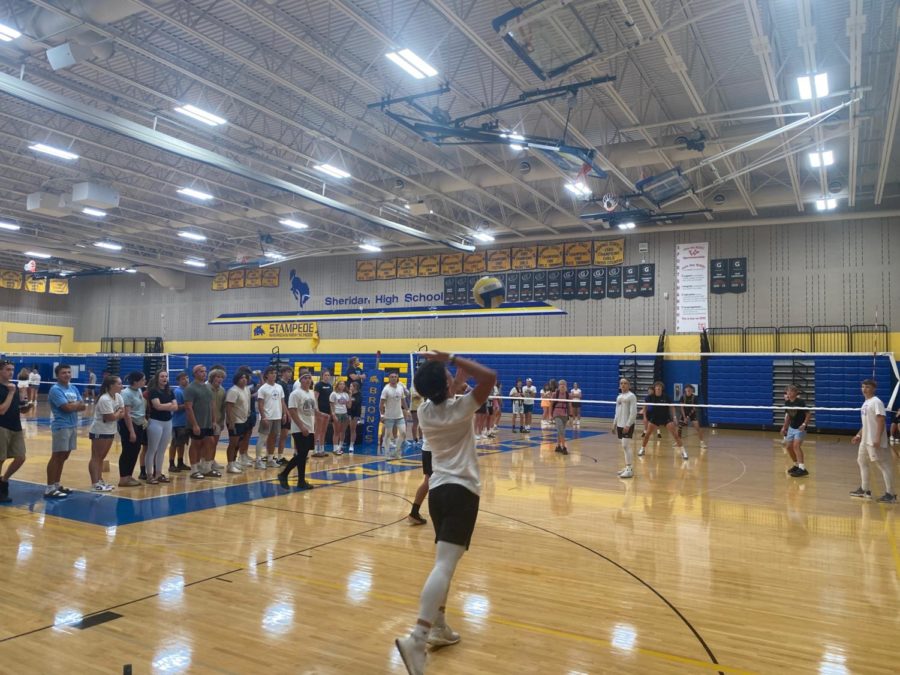 Seniors face the freshman during He-man Volleyball homecoming event. 