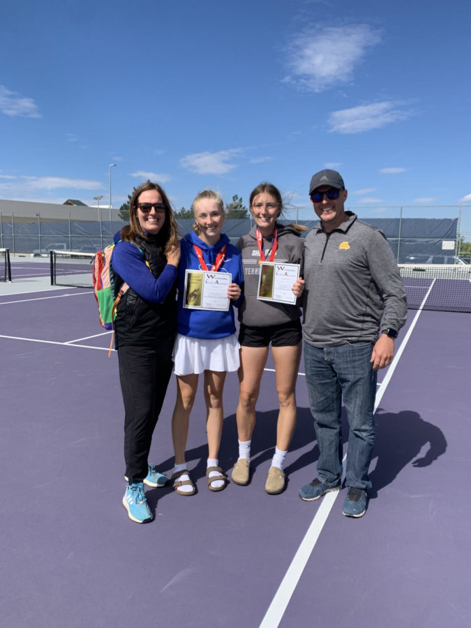 Bilyeu and her family celebrate after her state tennis win.